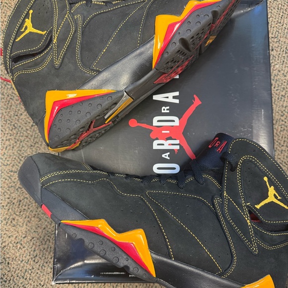 yellow and black jordan 7